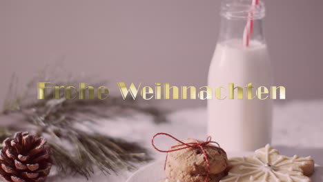 frohe weihnachten texto en oro sobre galletas de navidad y leche sobre fondo gris