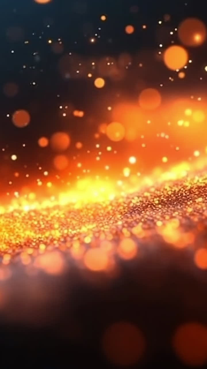 Sparkling firelight in dark. Flickering orange and gold particles dance across a dark background, creating a warm and enchanting atmosphere.