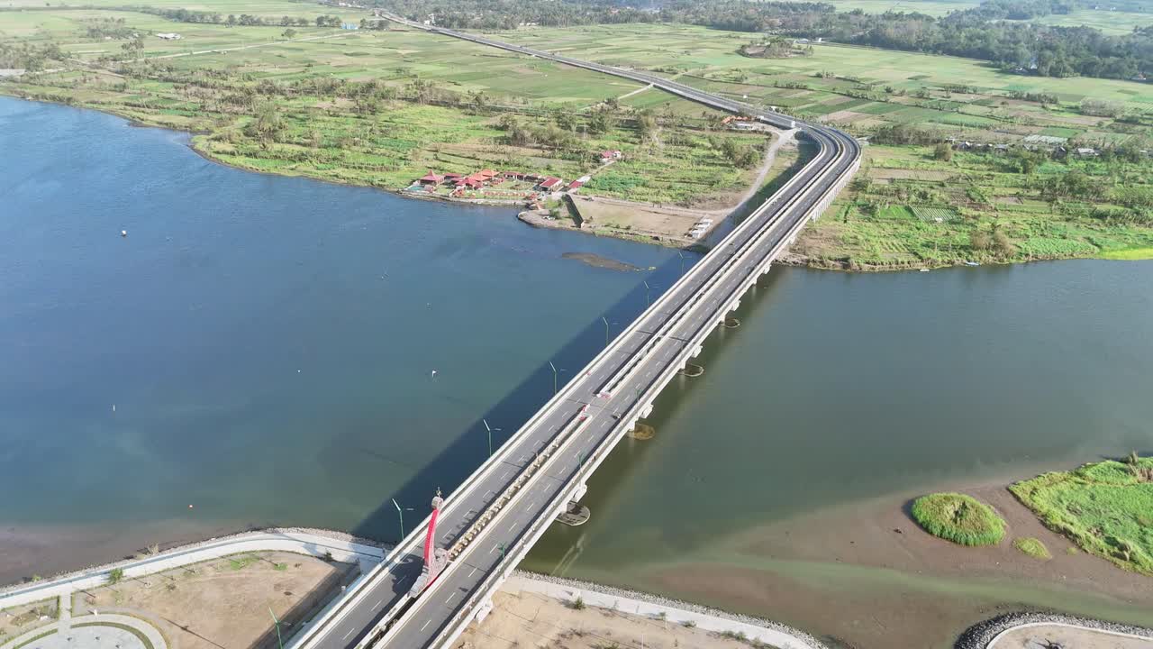 Scenic aerial view of bridge on big river in rural Indonesia. Kretek II Bridge, Opak River, Yogyakarta, Indonesia.