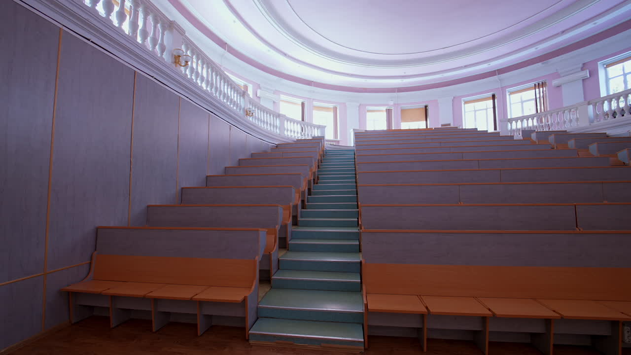 An empty lecture hall in a University. Interior of contemporary lecture theater in university campus