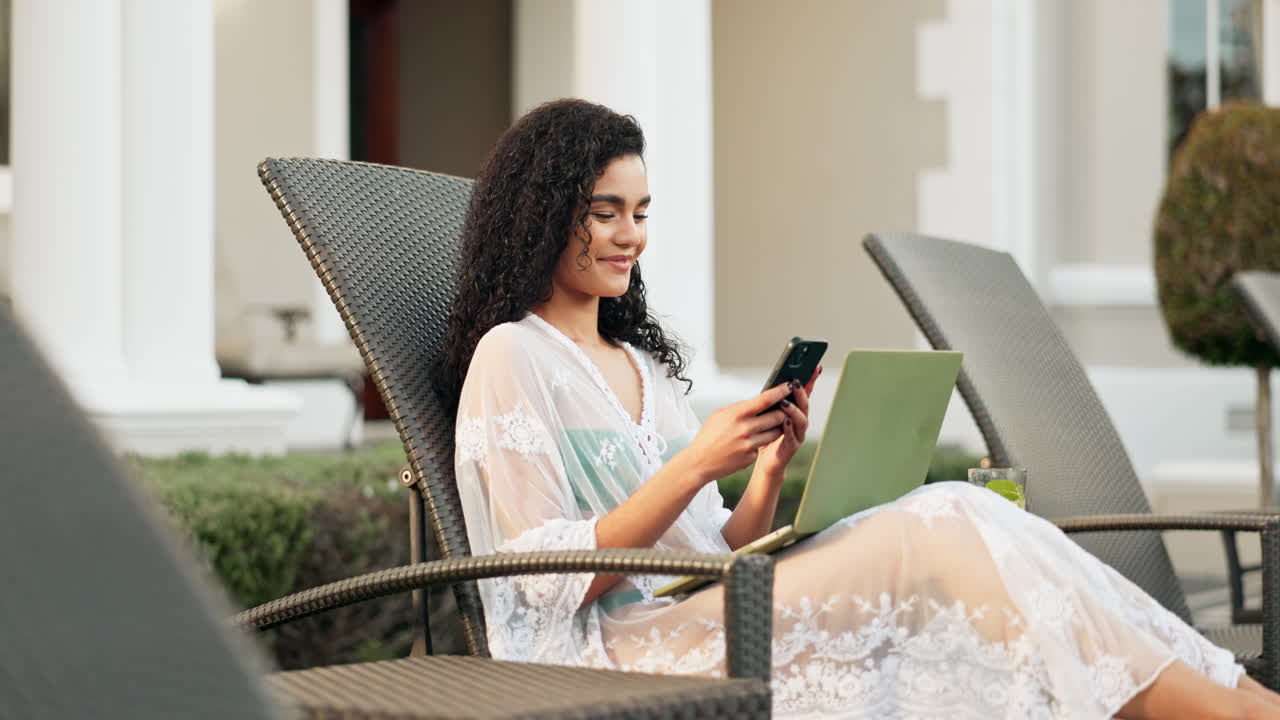 Woman Lounging Poolside with Laptop and Smartphone