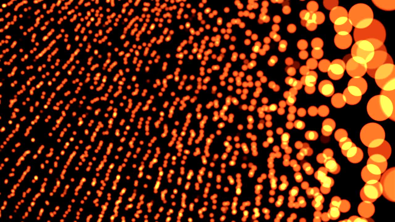 abstract bokeh background dancing particles golden gold
