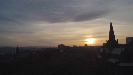 Beautiful-4K-shot-of-sunset-in-Glasgow-from-a-hill