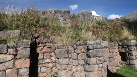 A-Spectacular-View-of-Cusilluchayoc-El-Templo-de-Los-Monos-in-Cusco-District,-Peru---Aerial-Pan-Right