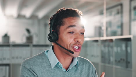 a man wearing a headset in an office environment