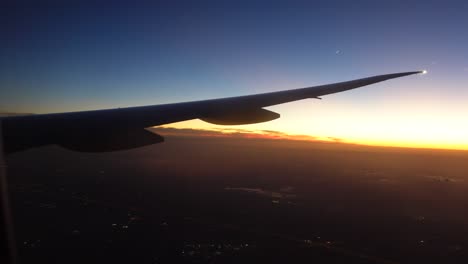 airplane wing sunset view from window