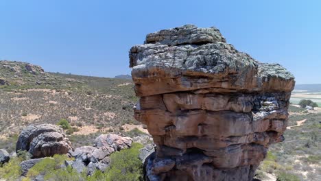 Aerial-view-of-rock-formation-on-a-sunny-day-4k