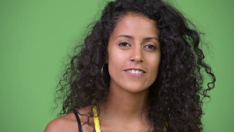 young happy beautiful hispanic woman talking