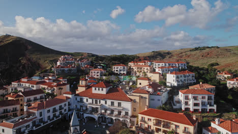 aerial view of a charming town nestled in a mountainous region