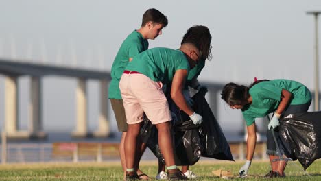 young volunteers sorting rubbish