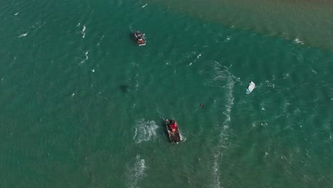 Aerial-top-down-shot-of-Kitesurfer-having-fun-on-Atlantic-Ocean-in-Brazil-during-summer