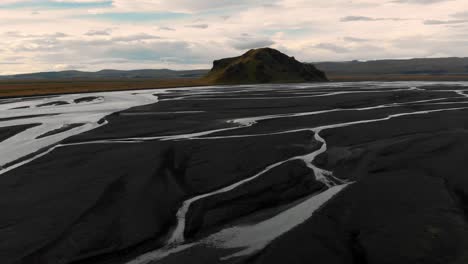 iceland mountain and river panning drone reveal at sunset