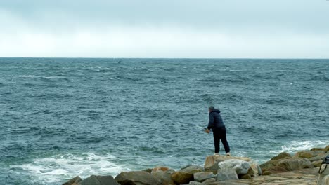 fisherman fishing porto portugal