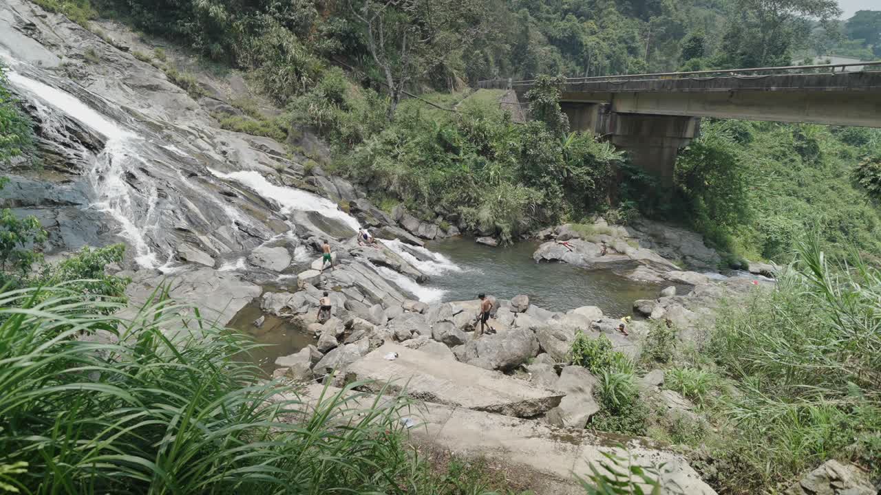 Waterfall Scene with People