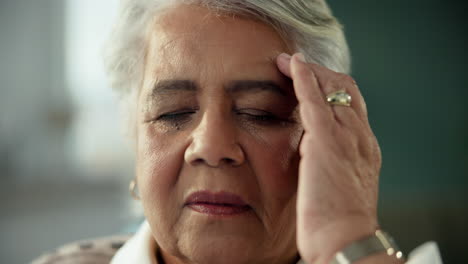 woman experiencing a headache