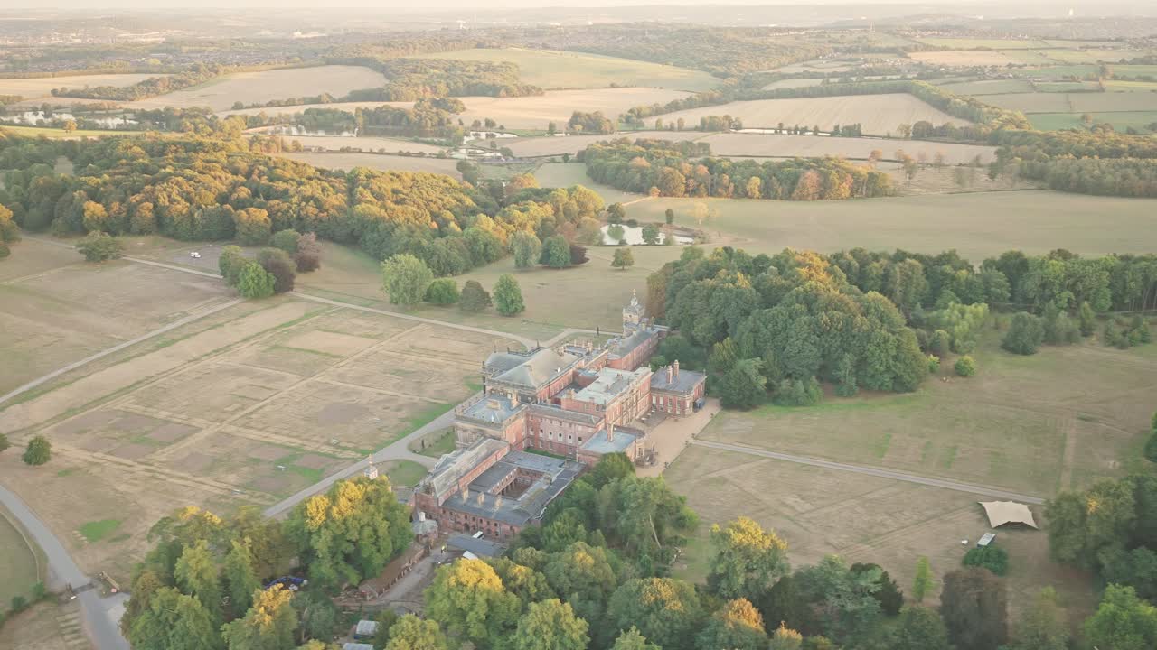 rom a wide drone glide, Wentworth Woodhouse stretches across South Yorkshire’s countryside with its historic wings, tree-lined paths, and open fields bathed in soft seasonal light