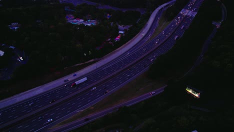 Marietta,-Georgia-traffic-flow-on-I-75,-after-sunset-in-the-evening