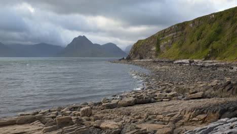 A-timelapse-of-the-Cuillin-mountain-range-as-viewed-from-Elgol,-with-stormy-cloud-movement-across-the-mountains