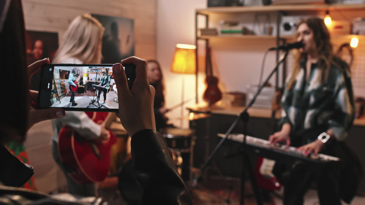 Recording Video Of All-Girl Music Band Playing