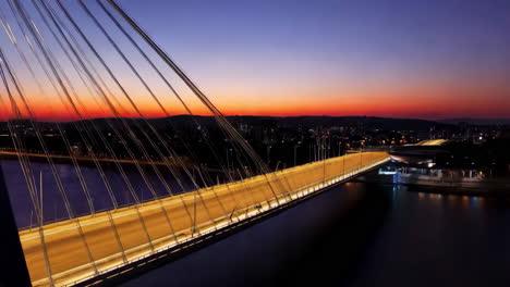 illuminated modern bridge at sunset