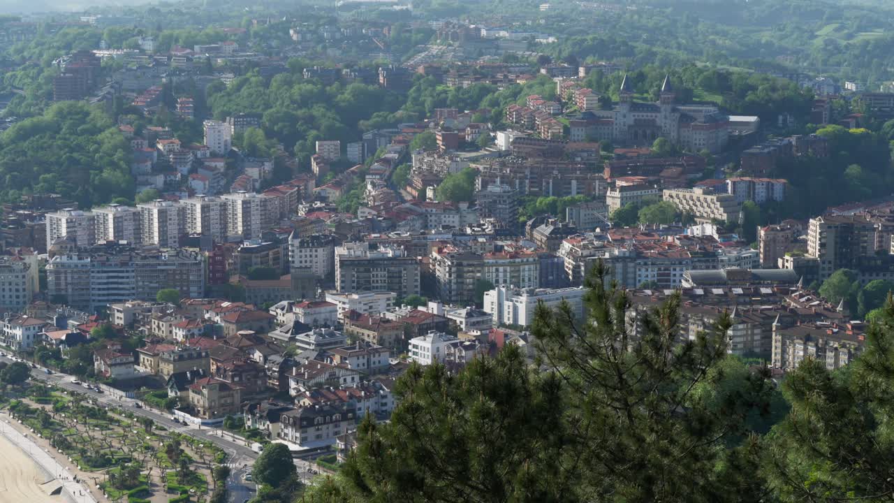Soft pan left over residential area of San Sebastian nestled among hills. Urban architecture