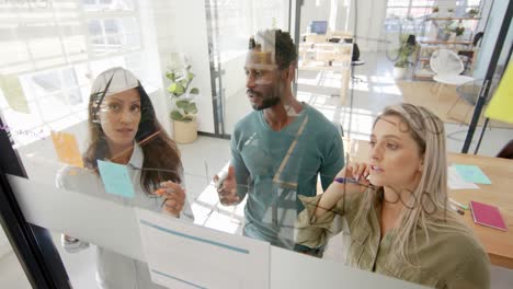 Busy-diverse-business-people-discussing-work-at-glass-wall-in-slow-motion