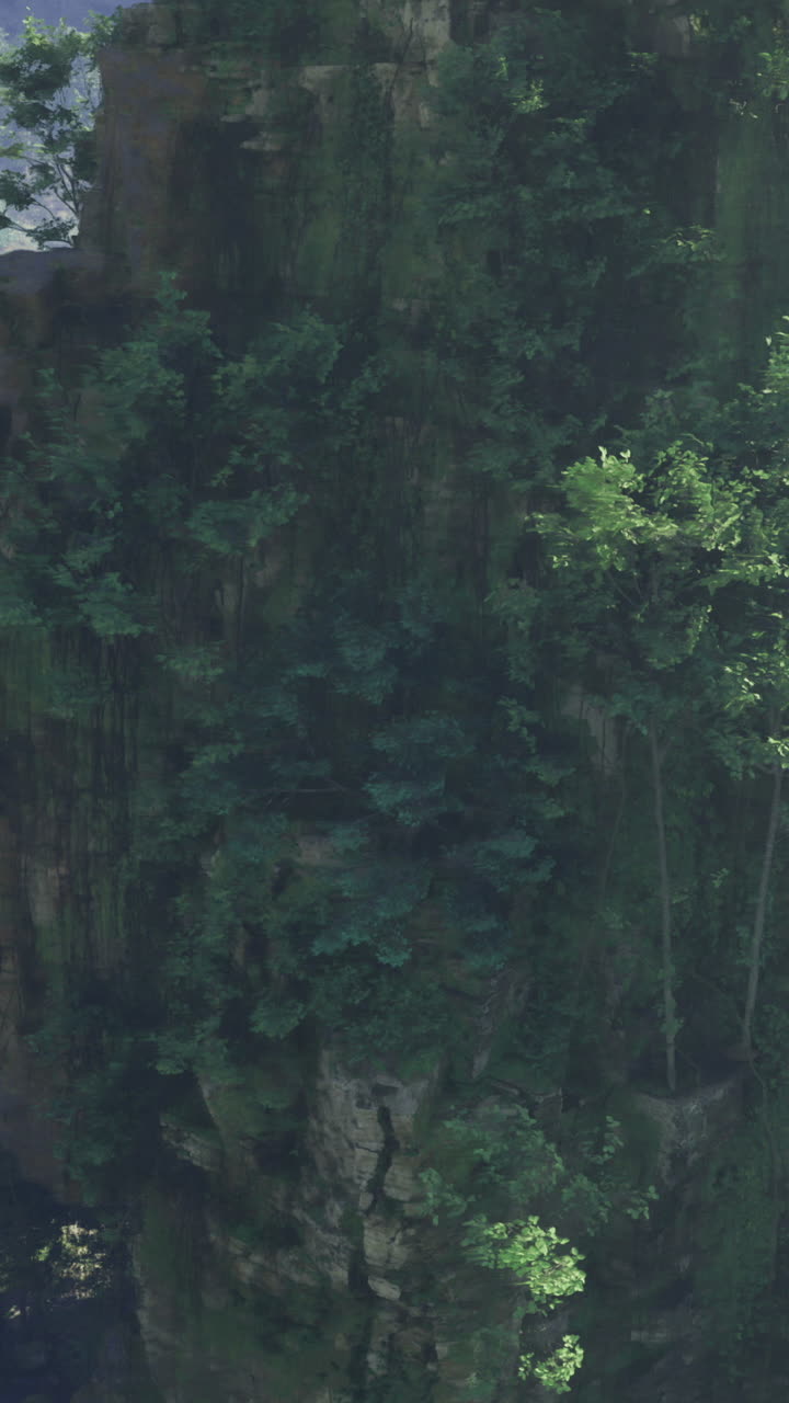 Breathtaking view of lush green cliffs in a mountainous region during daylight