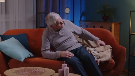 scared tired senior man wakes up from bad nightmare in bedroom at home stress nervousness anxiety