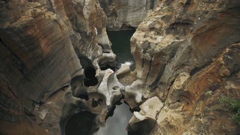 rock formations from flowing water at a quarry in south africa - 4k