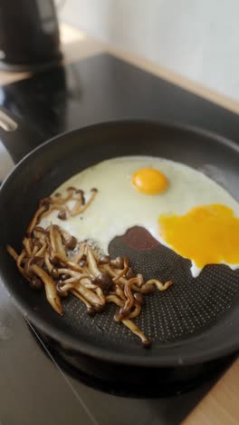 fried eggs with mushrooms