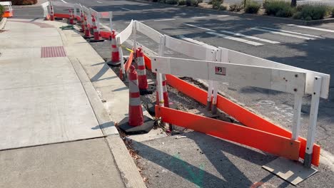 construction on a road with broken asphalt and cement