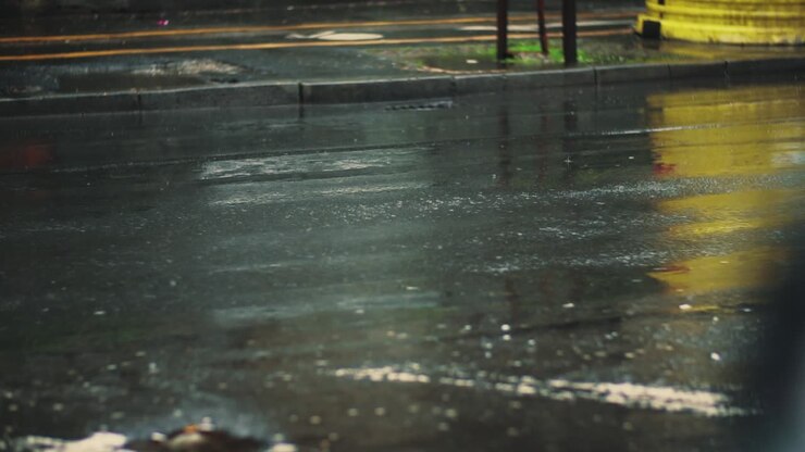 Car Tyres Driving Over Deep Pond And Splashing Water In Slow Motion
