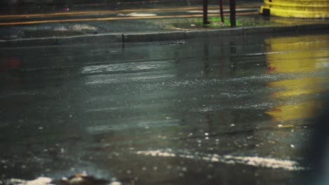 Car-Tyres-Driving-Over-Deep-Pond-And-Splashing-Water-In-Slow-Motion