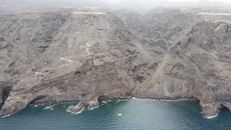 top view on the steep coast on canary island la palma, spain, on a cloudy day