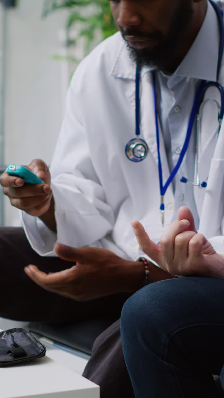 Vertical video: Physician doing insulin level measurement