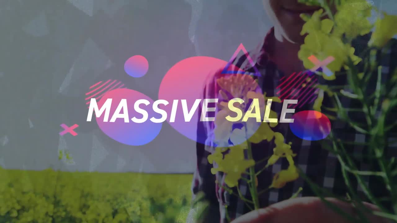 Markedsføringsgrafikk animerer, staver «MASSIVT SALG», utvides og avslører en mann som løfter en gul blomst.