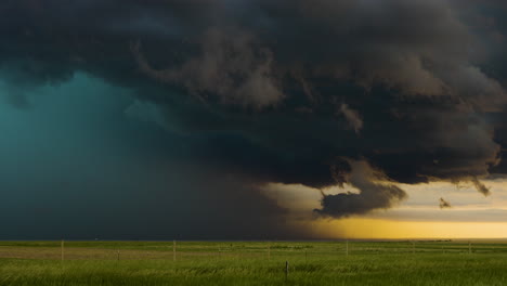 time lapse of storm clouds full of color moving across beautiful open plains