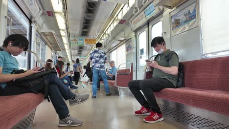 passengers inside a commuter train
