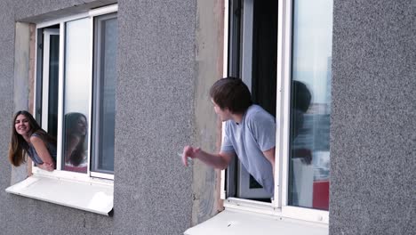 couple looking through windows