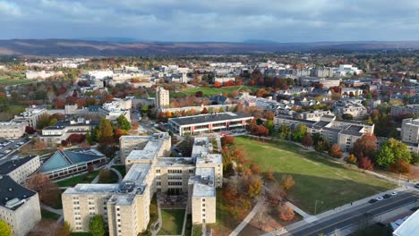 wide aerial shot of virginia tech college campus in blacksburg, va during autumn