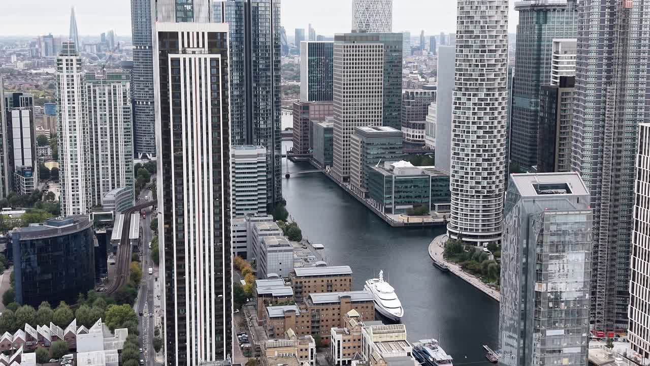Canary Wharf Isle of Dogs London residentia and offices aerial reverse reveal