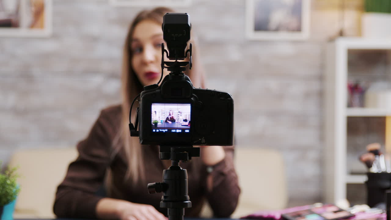Vlogger recording a video for her channel