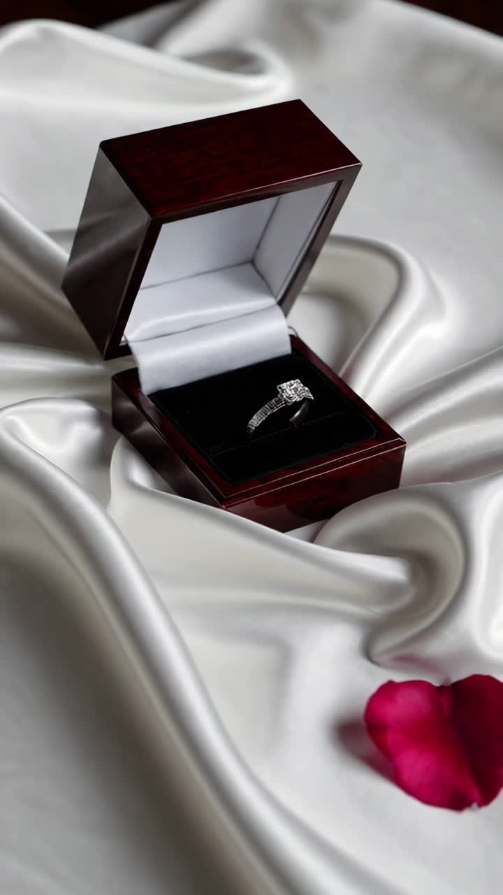 Elegant Engagement Ring in a Wooden Box on Satin