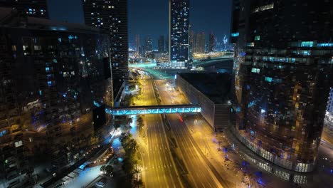 streets on al reem island in abu dhabi, united arab emirates at nighttime - panoramic hyper lapse