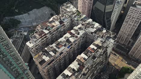 aerial over an old apartment complex called yick fat on quarry bay, hong kong, china