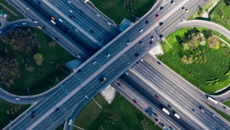 timelapse aerial view of a freeway intersection traffic trails in moscow.