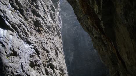looking up inside a large cave | grindelwald switzerland cave in glacier canyon, europe, 4k