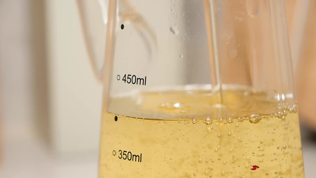 Oil in a measuring container