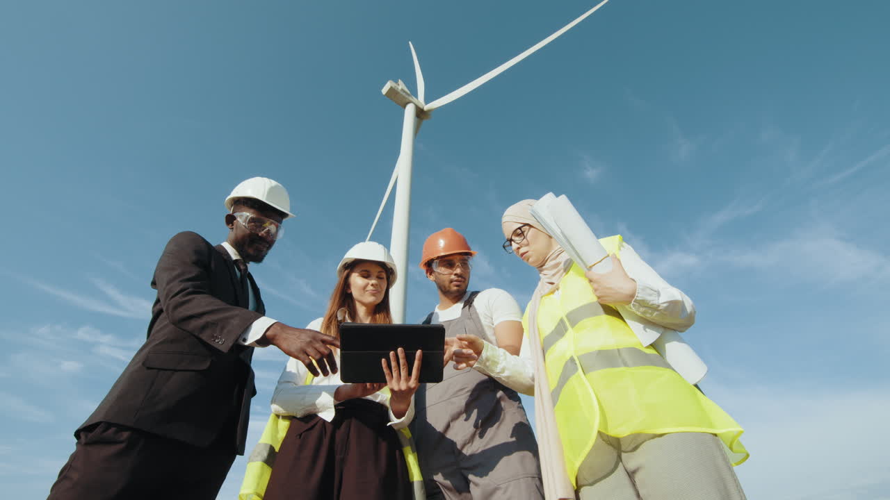 Team of Engineers Discussing Wind Turbine Project