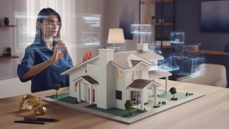 Woman Interacting with an Augmented Reality House Model